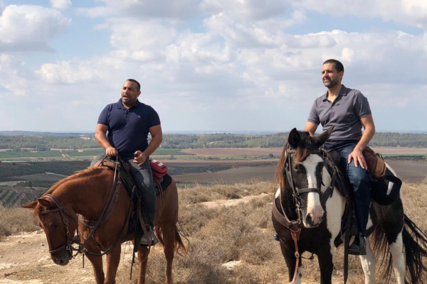 Former member of the Israeli Knesset Abir Kara goes horseback riding with Bahraini Ambassador to Israel Khaled Al Jalahma.  Image sourced from Khaled Al Jalahma via X.